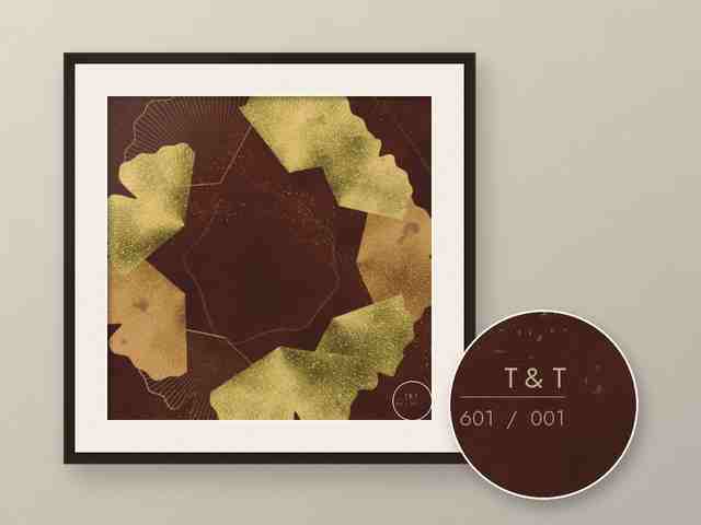 Work 601 by Trace & Tone: golden ginkgo leaves on deep burgundy, framed with a mount. A magnifier shows the mark and the work number at the bottom right.